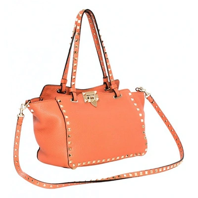 Pre-owned Valentino Garavani Rockstud Leather Handbag In Orange