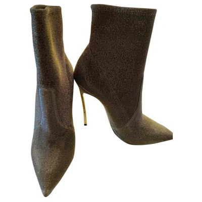 Pre-owned Casadei Glitter Ankle Boots In Gold