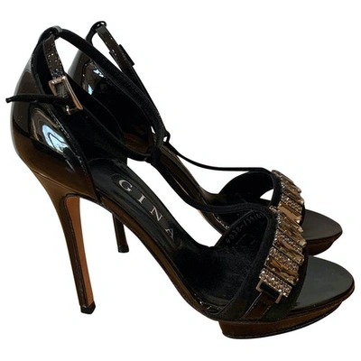 Pre-owned Gina Patent Leather Sandals In Black