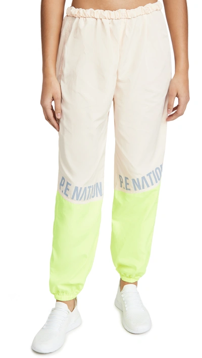 P.e Nation Neutrals First Position High Waist Track Pants In Pearled Ivory