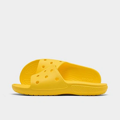 Crocs Classic Slide Sandals In Lemon