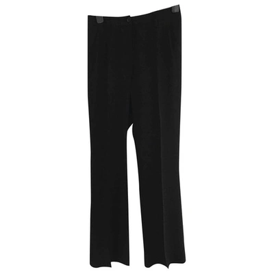 Pre-owned Moschino Love Trousers In Black