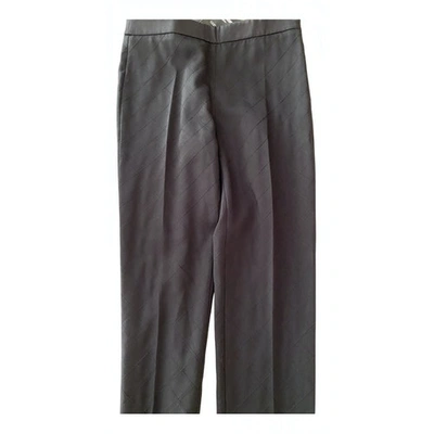 Pre-owned Moschino Trousers In Black