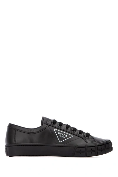 Prada Cassetta Wheel Leather Sneakers In Black