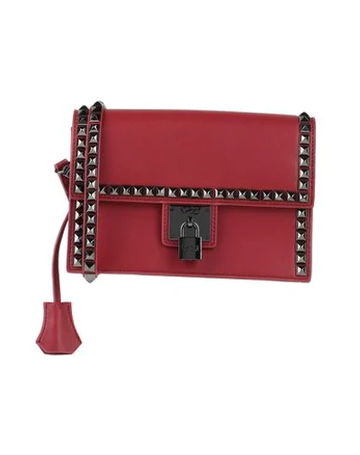 V73 Handbags In Brick Red