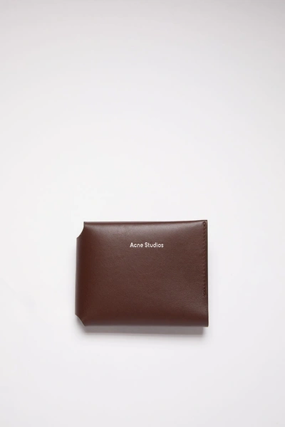 Acne Studios Grained-effect Trifold Wallet In Dark Brown