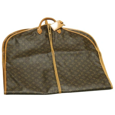 Pre-owned Louis Vuitton Cloth Travel Bag In Brown