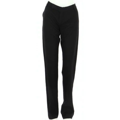 Pre-owned Maje Wool Trousers In Black