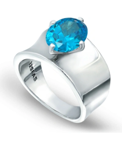 Macy's Cubic Zirconia Prong Set Oval Stone On Polished Cigar Band In Silver Plate And Gold Plate In Blue