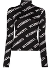 VETEMENTS LOGO PRINT ROLL NECK TOP