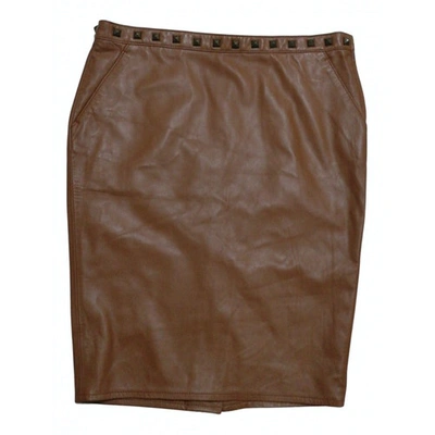 Pre-owned Moschino Leather Mid-length Skirt In Brown