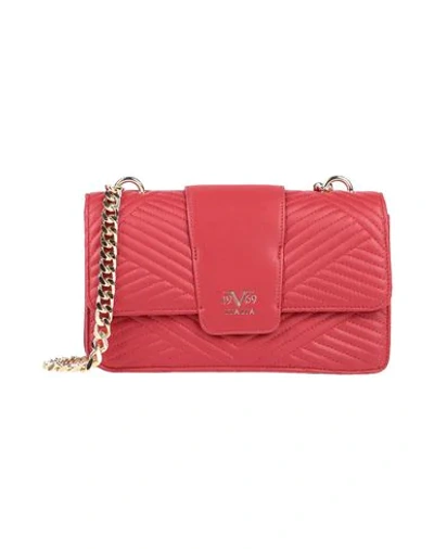 19v69 By Versace Handbags In Red