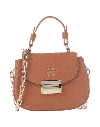 19v69 By Versace Handbags In Brown