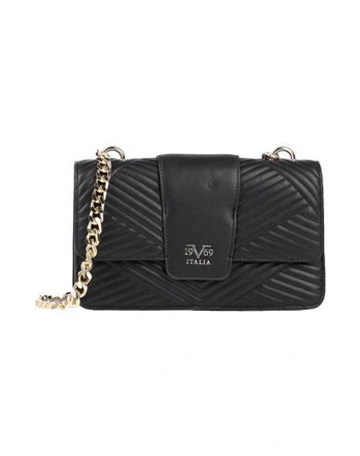 19v69 By Versace Handbags In Black