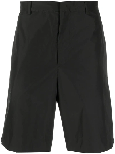 Prada Triangle Patch Logo Shorts In Schwarz