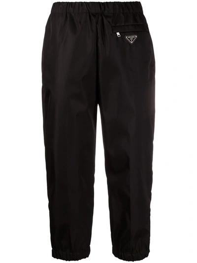 Prada Cropped Logo Plaque-detail Trousers In Black