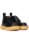 Bottega Veneta The Bounce Leather Ankle Boots In Black Nat. Rubber