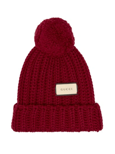 Gucci Logo-tag Wool Bobble Hat In Lacquer