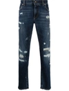 DOLCE & GABBANA EMBOSSED LOGO RIPPED SLIM-FIT JEANS