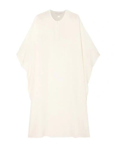 Marie France Van Damme Cover-ups In White