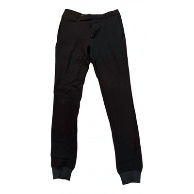 Pre-owned Carven Wool Trousers In Black