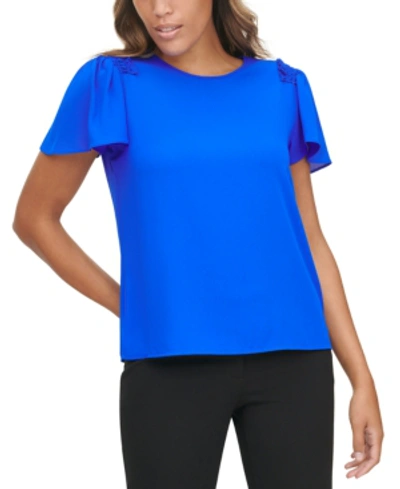 Calvin Klein Ruffled Short Sleeve Blouse In Capri