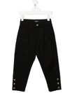 Balmain Buttoned-embellished Tapered Trousers In Black