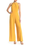 Nina Leonard Twist Halter Ity Knit Jumpsuit In Mustard