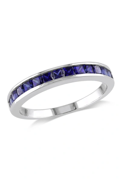 Delmar Sterling Silver Created Blue Sapphire Eternity Ring
