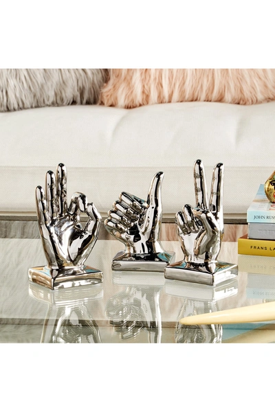 Cosmoliving By Cosmopolitan Large Metallic Polished Silver Hand Sculpture
