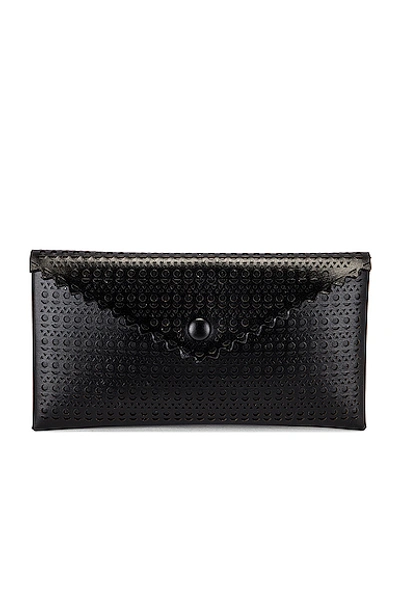 Alaïa Louise 24 Leather Perforated Clutch In Noir