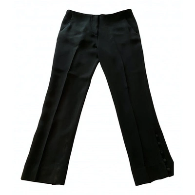 Pre-owned Miu Miu Trousers In Black