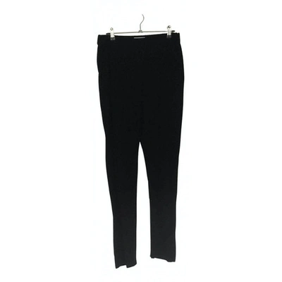 Pre-owned Megan Park Trousers In Black