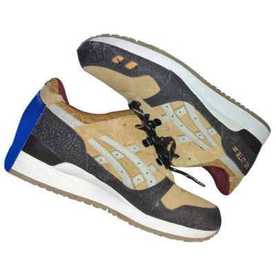 Pre-owned Asics Low Trainers In Yellow