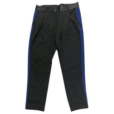 Pre-owned Haider Ackermann Wool Trousers In Black