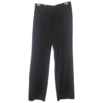 Pre-owned Dries Van Noten Wool Trousers In Black