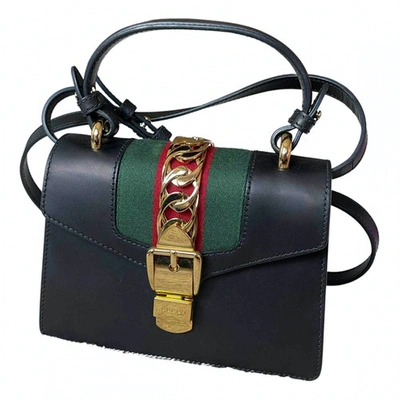 Pre-owned Gucci Sylvie Top Handle Leather Handbag In Black