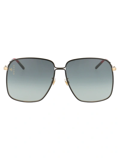 Gucci Gg0394s Sunglasses In 001 Gold Gold Grey