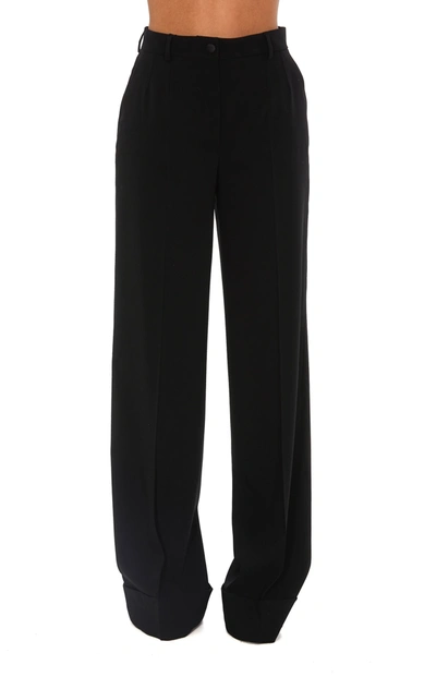 Dolce & Gabbana Virgin Trousers In Black