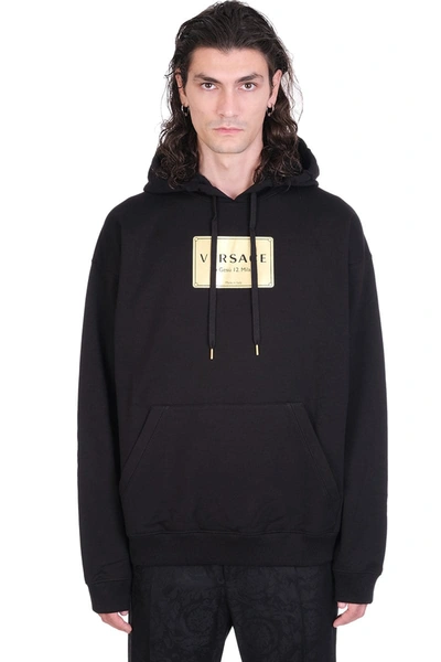 Versace Logo Graphic Cotton Hoodie In Black,gold