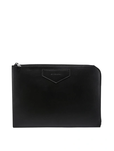 Givenchy Embossed Logo Clutch In Black