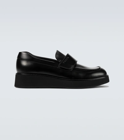 Prada Brushed Leather Loafers In Black