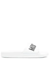 Moschino Embossed Logo Pool Slides In White