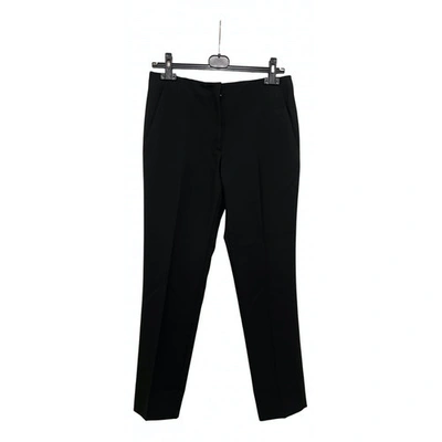 Pre-owned Dior Wool Trousers In Black