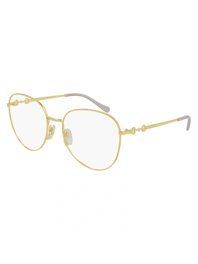 Gucci Gg0880o Eyewear In Gold Gold Transparent