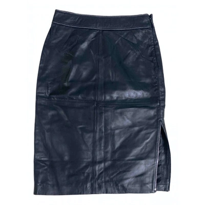 Pre-owned Moschino Leather Mid-length Skirt In Black