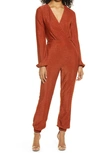 Bebe Metallic Knit Long Sleeve Jumpsuit In Copper