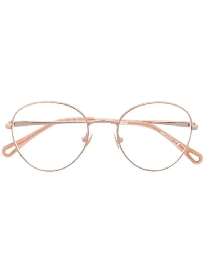 Chloé Transparent Round Frame Glasses In Orange
