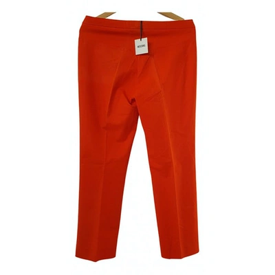 Pre-owned Moschino Trousers In Orange