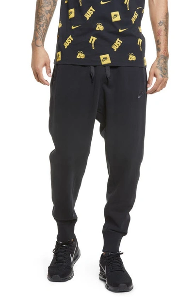 Nike Sportswear Tapered Logo-embroidered Loopback Cotton-jersey Sweatpants In Black/ Off Noir